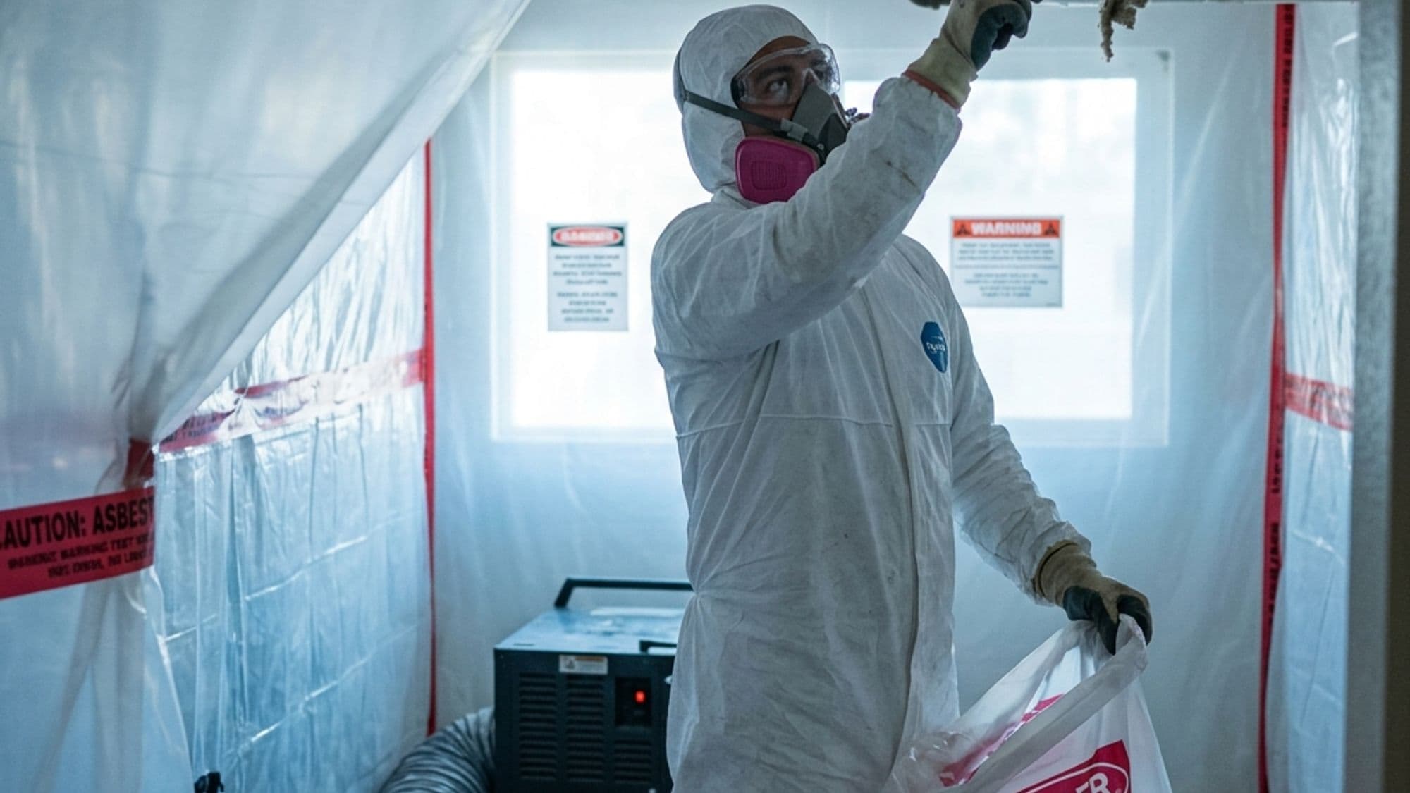 A licensed Asbestos Abatement contractor at work on a California project